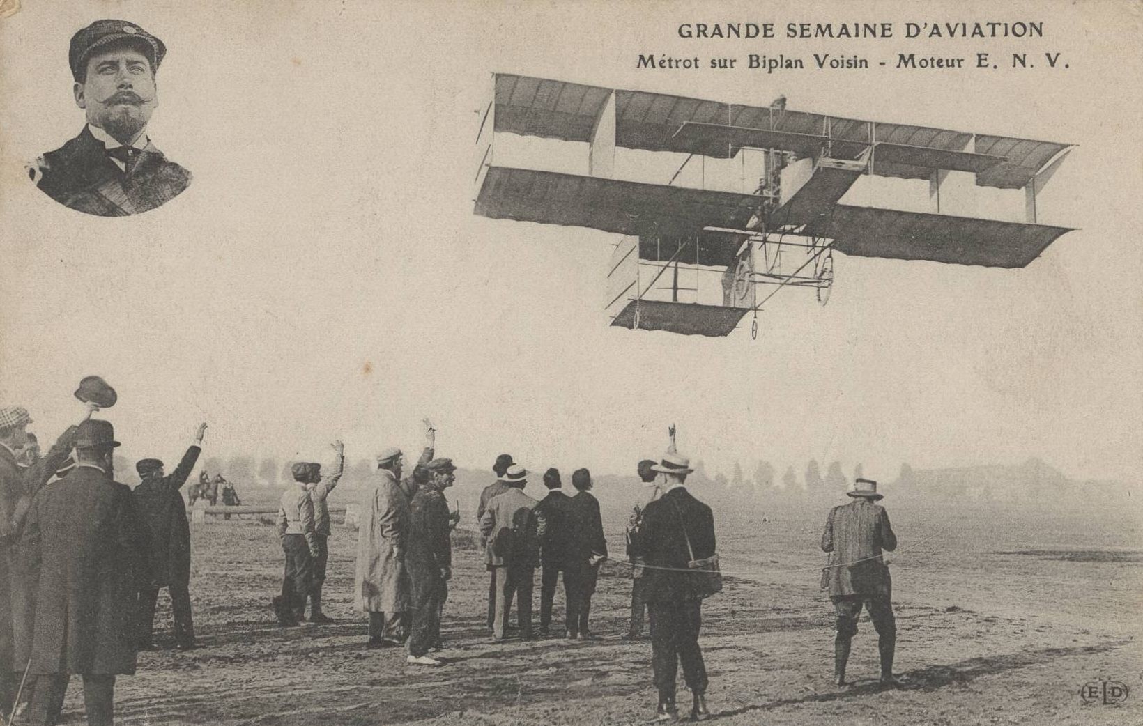 Grande semaine d'aviation - Métrot sur biplan Voisin. Moteur E.N.V. : carte postale NB (1910, cote 4FI_4344)